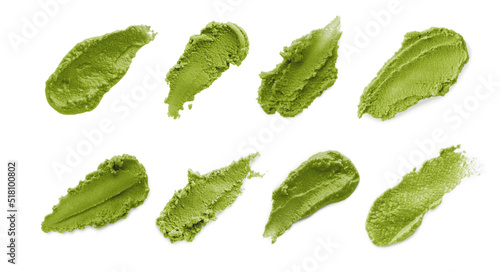 Set with spicy wasabi paste on white background, top view