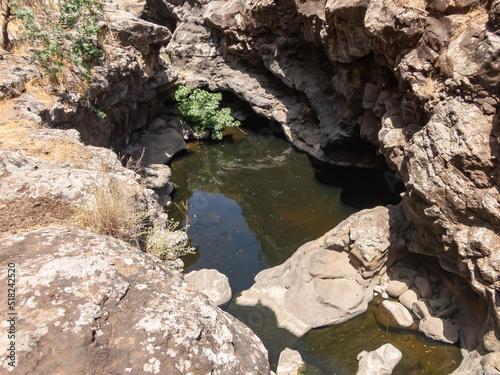 Small lake in the Black Gorge on the banks of the Zavitan stream in the Golan Heights, near to Qatsrin, northern Israel