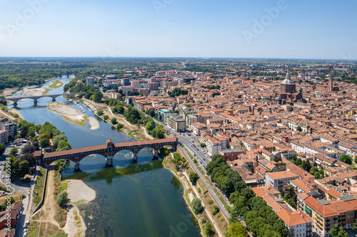 Aerial view of Pavia and the Ticino River, View of the Cathedral of Pavia, Covered Bridge. Lombardia, Italy
