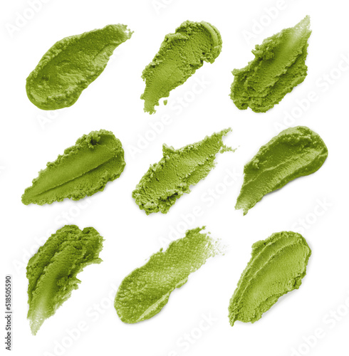 Set with spicy wasabi paste on white background, top view