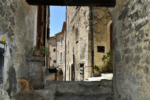 Narrow street surrounded by stony buildings in village San Donato Val di Comino