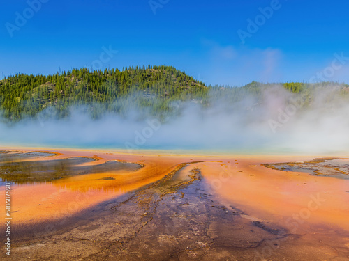 Sunny view of beautiful landscape along Grand Prismatic Spring