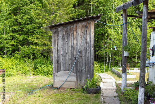 Country wooden toilet. Natural. Outdoor toilet