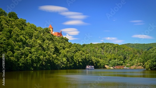 Beautiful old castle Veveri. Landscape with water on the Brno dam during summer holidays on a sunny day. Czech Republic - Brno.