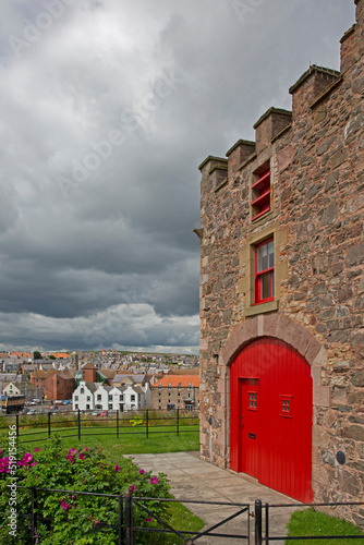 The 'Nisbets tower' dovecot picturesque coastal fishing village of Eyemouth and Eyemouth harbour in Scotland