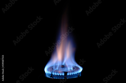 gas flame burns on a stove