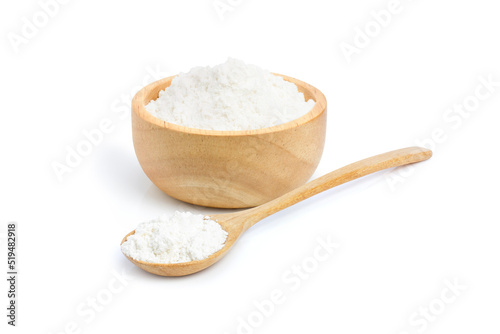 Tapioca starch (potato flour or powder) in wooden bowl and spoon isolated on white background.