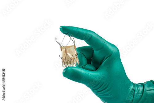 Heart valve surgery cardiology for patient in hospital. Prepare Transcatheter aortic valve implantation in doctor's hand. Isolated on white background.