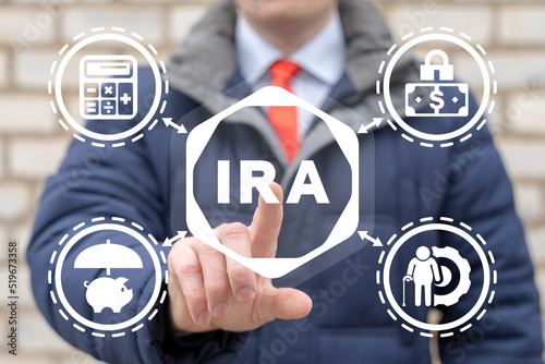 Concept of IRA Individual Retirement Account. Choice of traditional IRA or roth IRA retirement plans.