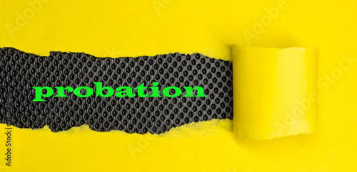  Probation.Word written yellow cardboard under modern black background.