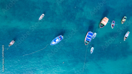People practicing paddleboarding on the sea