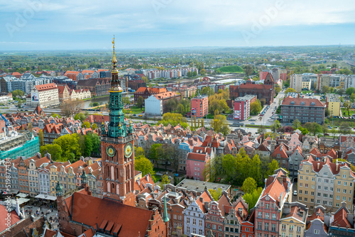 Aerial vief of historical city of Gdansk, Poland, on a nice day of spring. Old buildings and water canals on the brink of Baltic sea. Traditional architecture.