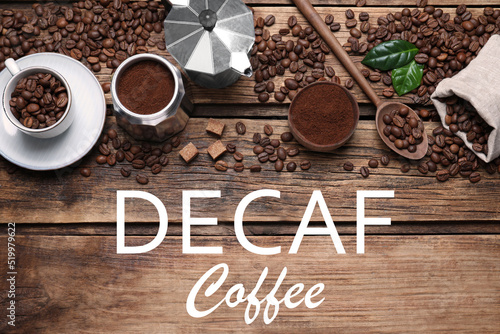 Flat lay composition with decaf coffee beans on wooden table