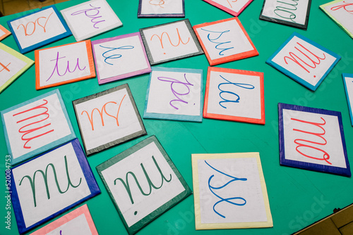 colored cards with syllables to learn to read and write