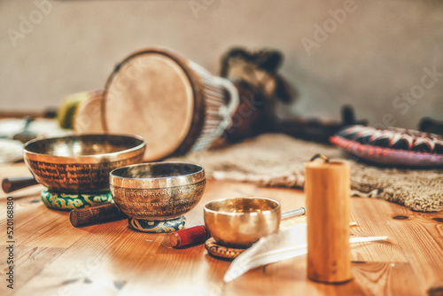 A still life of the shamanic drum and tibetan singing bowls.
