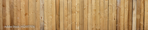 Textured background made of pine boards. Pine boards raw textured background
