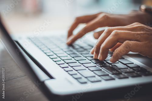 Typing on laptop closeup, chatting in social media, meeting website. Blogger, journalist writing new article.