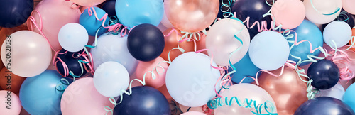 Various colorful balloons with serpentine