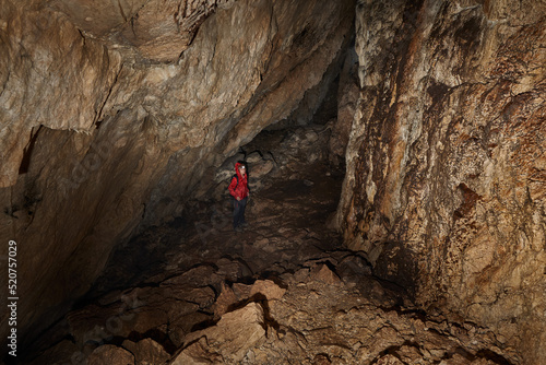 Woman explorer in a cave