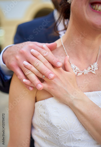 happy wedding day, husband holding wife's hand