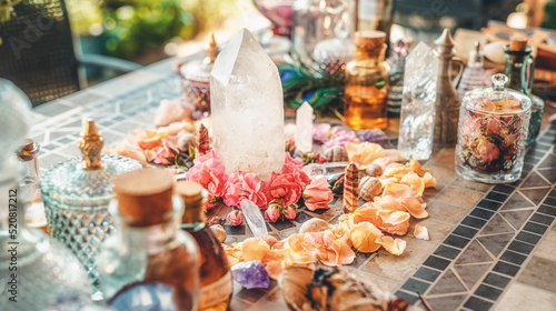 beautiful altar with crystals and rose flowers.