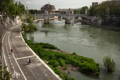 Tiber River with the Ponte Vittorio Emmanuelle II and the Castel Sant’ Angelo in the background in Rome