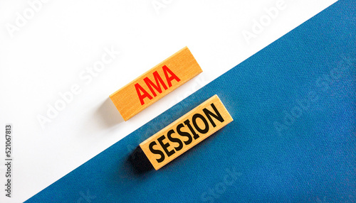 AMA ask me anything session symbol. Concept words AMA ask me anything session on wooden blocks on a beautiful white and blue background. Business and AMA ask me anything session concept. Copy space.