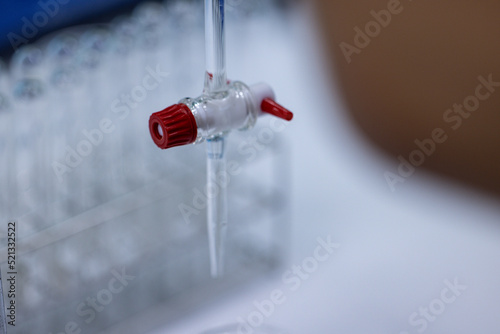 Scientist working Titration technique in the laboratory.