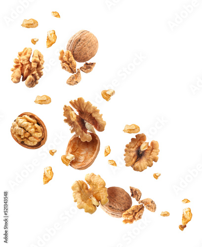 Flying walnuts isolated on white