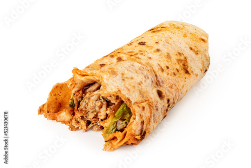 Isolated on a white background, Turkish doner or durum is a fast food with meat and salad wrapped in a flatbread. Unhealthy and greasy food
