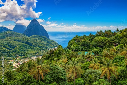 St. Lucia island with green hills, rocks, and tropical forests near the sea, the Caribbean