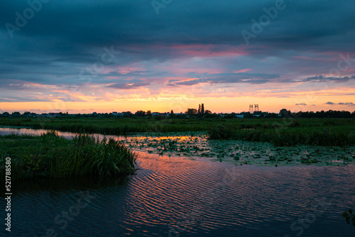 Purple sunset over the Dutch polder in the vicinity of Gouda, Holland