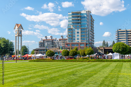 Downtown Coeur d'Alene, Idaho during one of it's annual street fair and festivals as vendor kiosks and booths line the main street, Sherman Avenue, during summer.