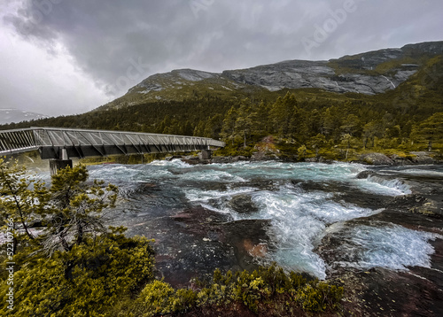Likholefossen waterfall in Norway with spectacular steel bridge