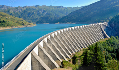 the roselend dam with turquoise water in a mountainous landscape in France