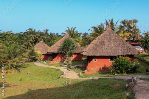 Traditional African Houses on the Axim Tropical Beach in Ghana, West Africa