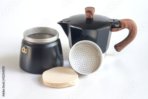 Mocha pot or Moka pot with paper filter on Background., coffee machine.