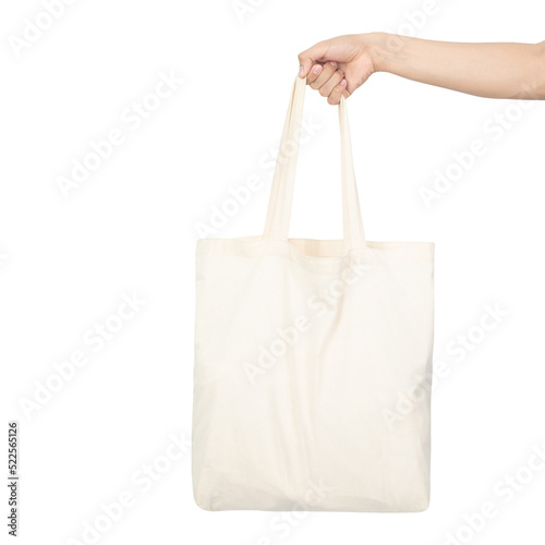 Hand holding tote bag mockup, Cutout.