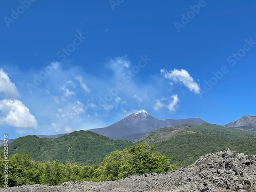 volcano landscape against a blue sky