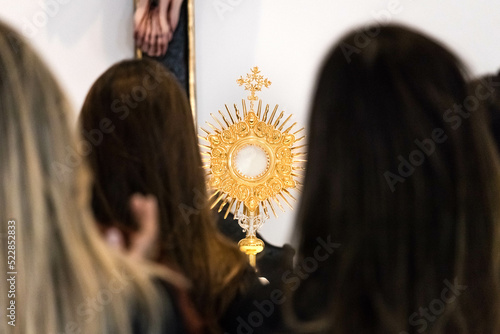 Worship at church, adoration of the Eucharistic Jesus at the catholic church