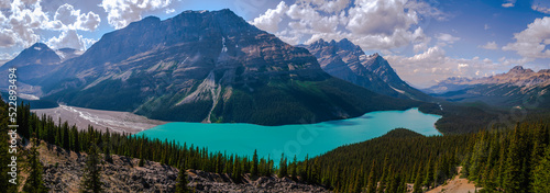 Peyto Lake and Mistaya Mountain seen from the Upper Panorama Overlook in Banff National Park. The turquoise blue glacier-fed lake on the Icefields Parkway in Alberta, Canada.