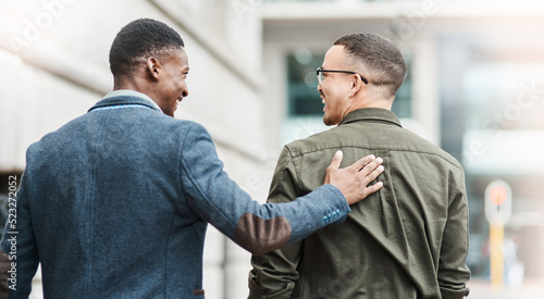 Support, trust and motivation between friends, coworkers and casual men feeling happy about job opportunity or promotion while walking in city during lunch break. Proud guy congratulating his buddy