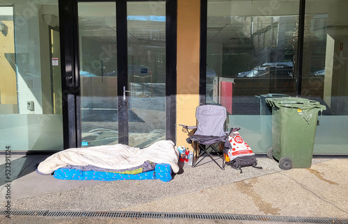 Sleeping bag and other items belonging to a homeless person living on the streets.