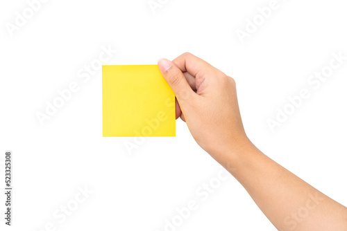 hand with yellow adhesive note
