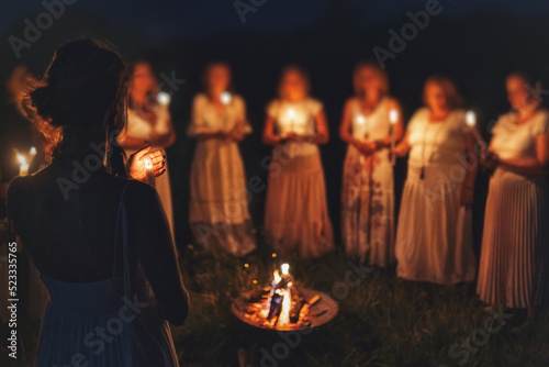 Women at the night ceremony. Ceremony space.