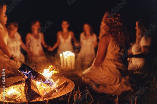 Women at the night ceremony. Ceremony space.