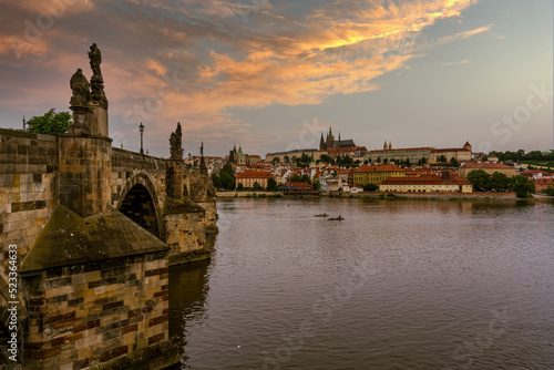 A view of old Prague, a bridge and a river from the coast.