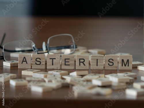 asterism concept represented by wooden letter tiles