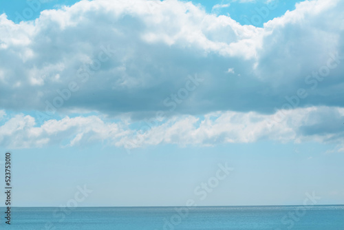 PIcturesque view of calm sea under cloudy sky