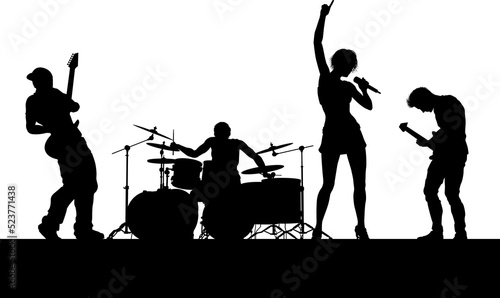 A musical group or rock band playing a concert in silhouette